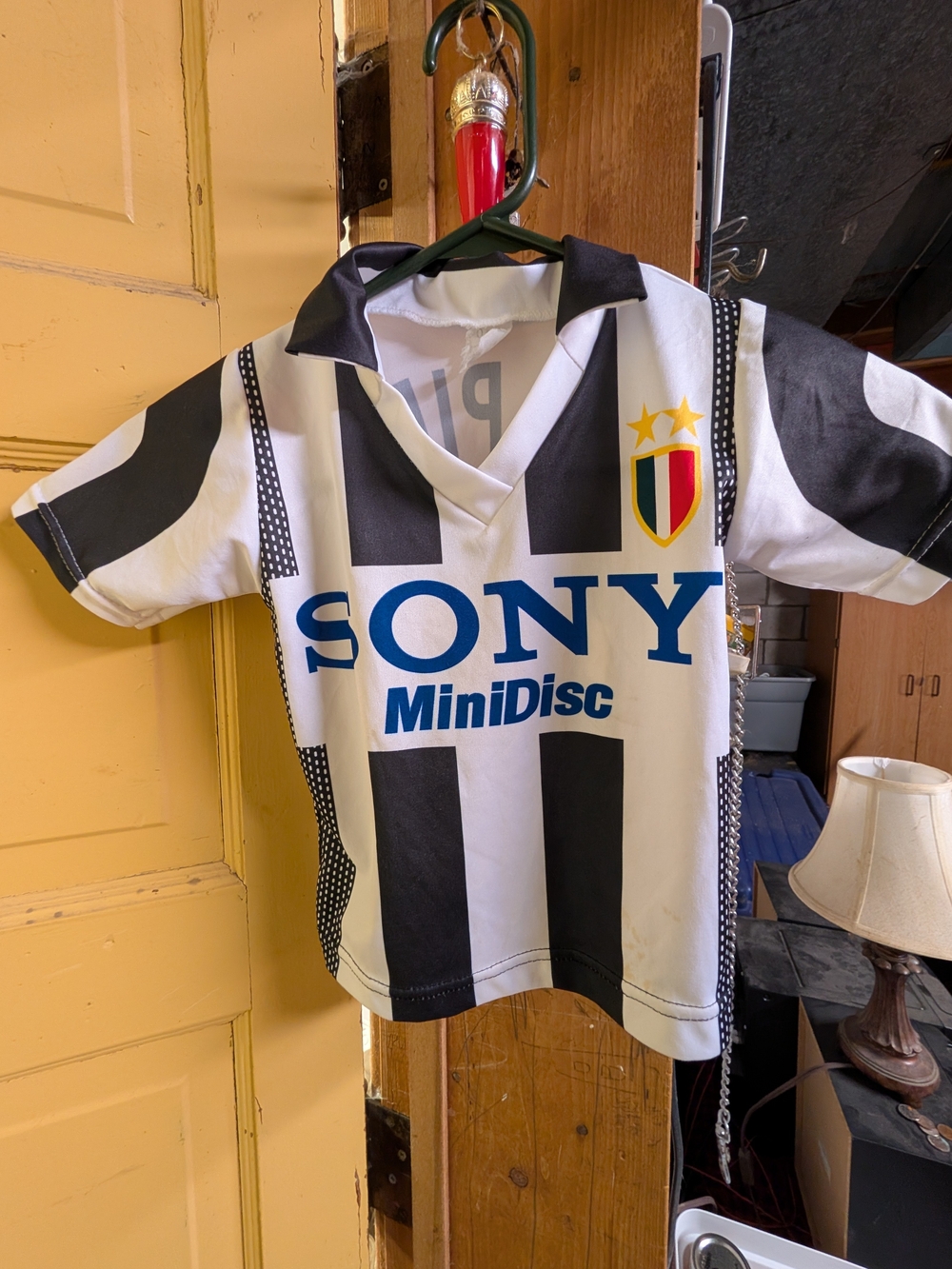 Kids Black & White Striped Soccer Jersey with Blue Sony Logo